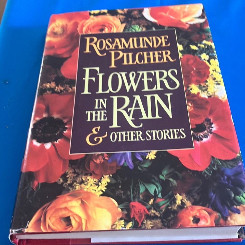 Flowers in the rain Hardcover Book